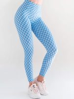 Efektowne niebieskie legginsy w kratkę z wysokim stanem