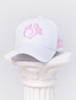 White cap with visor and pink Peach Pump logo