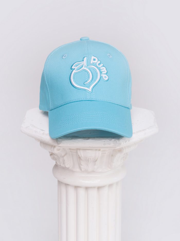 Baby blue cap with embroidered Peach Pump logo, frontal photo