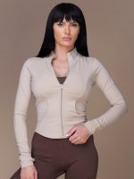 Sport jacket in beige on the body and pockets in the front by Peach Pump