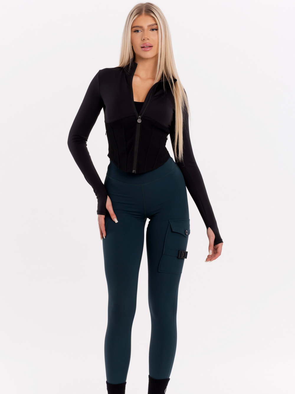 Tmavě zelené dámské legíny s kapsami a přezkou