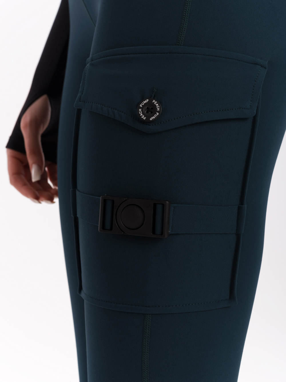 Tmavě zelené dámské legíny s kapsami a vysokým pasem