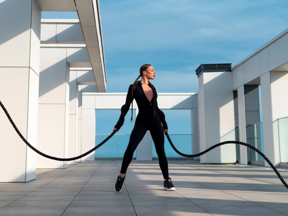 Black sports overalls with zipper for body sculpting workout