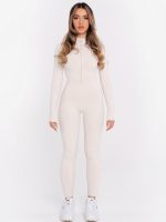 Zipped jumpsuit from "Peach Pump" with soft lining in beige