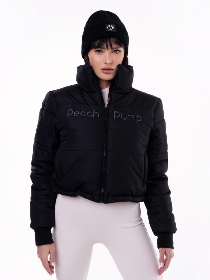 Black puffer jacket with modern design, cuffs on the sleeves, embroidery in the front and high collar