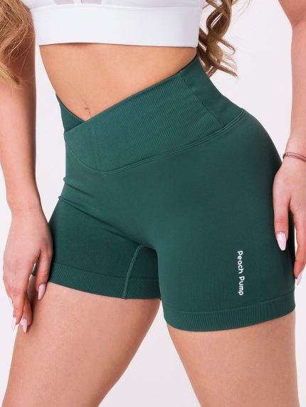 Dark green short leggings for aerobic or solo workouts in seamless, breathable fabric with V-waist