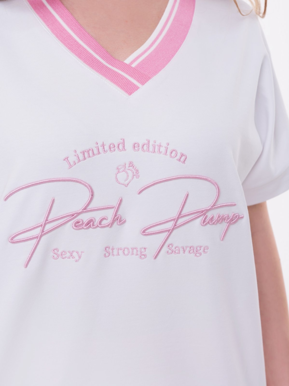 Sporty white blouse with short sleeves, embroidery in pink , V neckline and pink cuff