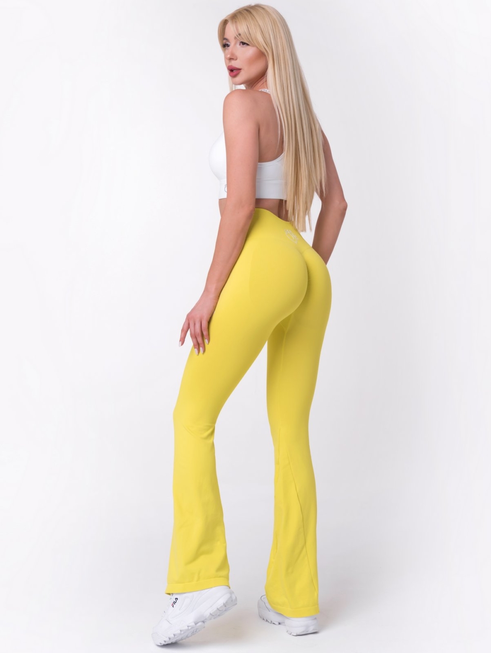 Trendy yellow flare leggings with high waist