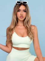 Women's light green sports bustier with Push-Up padding in seamless soft fabric