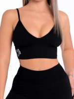 Black sports bra with deep V neckline and push-up pads