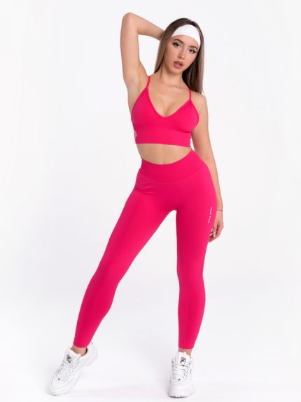 Seamless dark pink sports bra with padding and deep V neckline