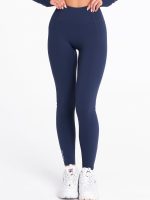 Dark blue leggings with medium rise waist by Peach Pump