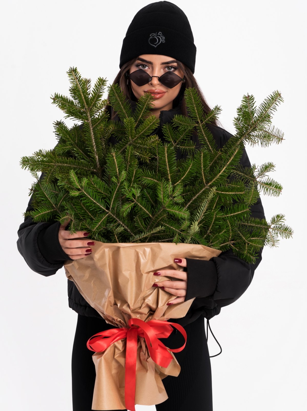 Black hat with embroidered Peach Pump logo