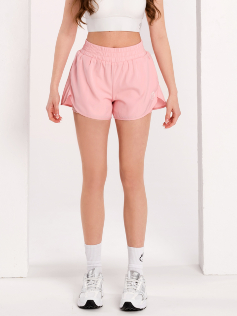 Pink sports shorts with inner layer and side pockets<br>