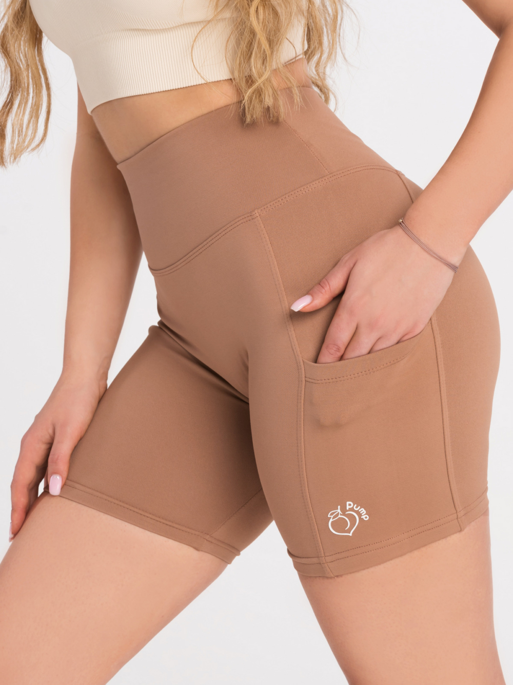 Women’s brown sports leggings with pockets and high waist