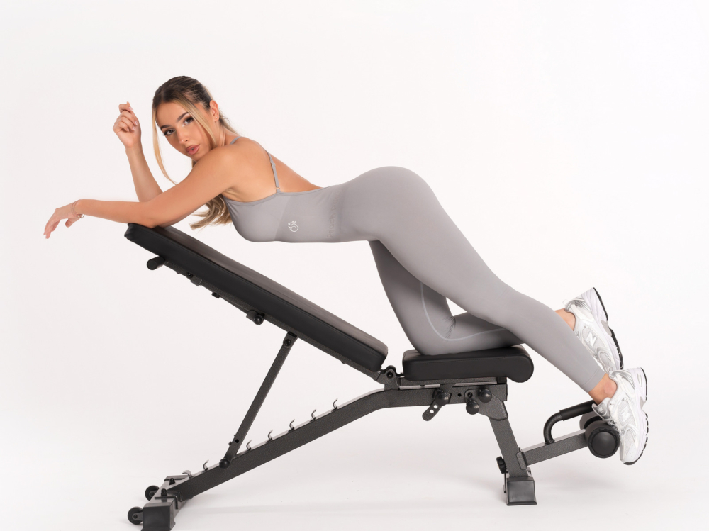 Fashionable women's overalls for sports made of seamless, elastic fabric and thin straps