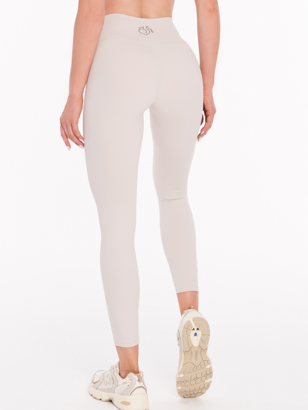 Μπεζ γυναικείο κολάν από ελαφρύ ελαστικό ύφασμα για το καλοκαίρι