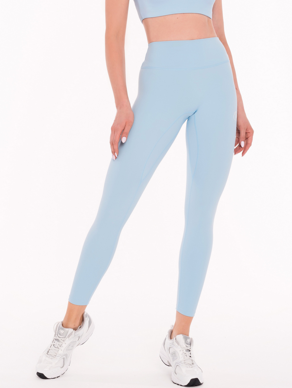 Модерен светло син спортен дамски кин със средна тали и еластична материя