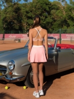 Pink sports set skirt with inner shorts and sports bra