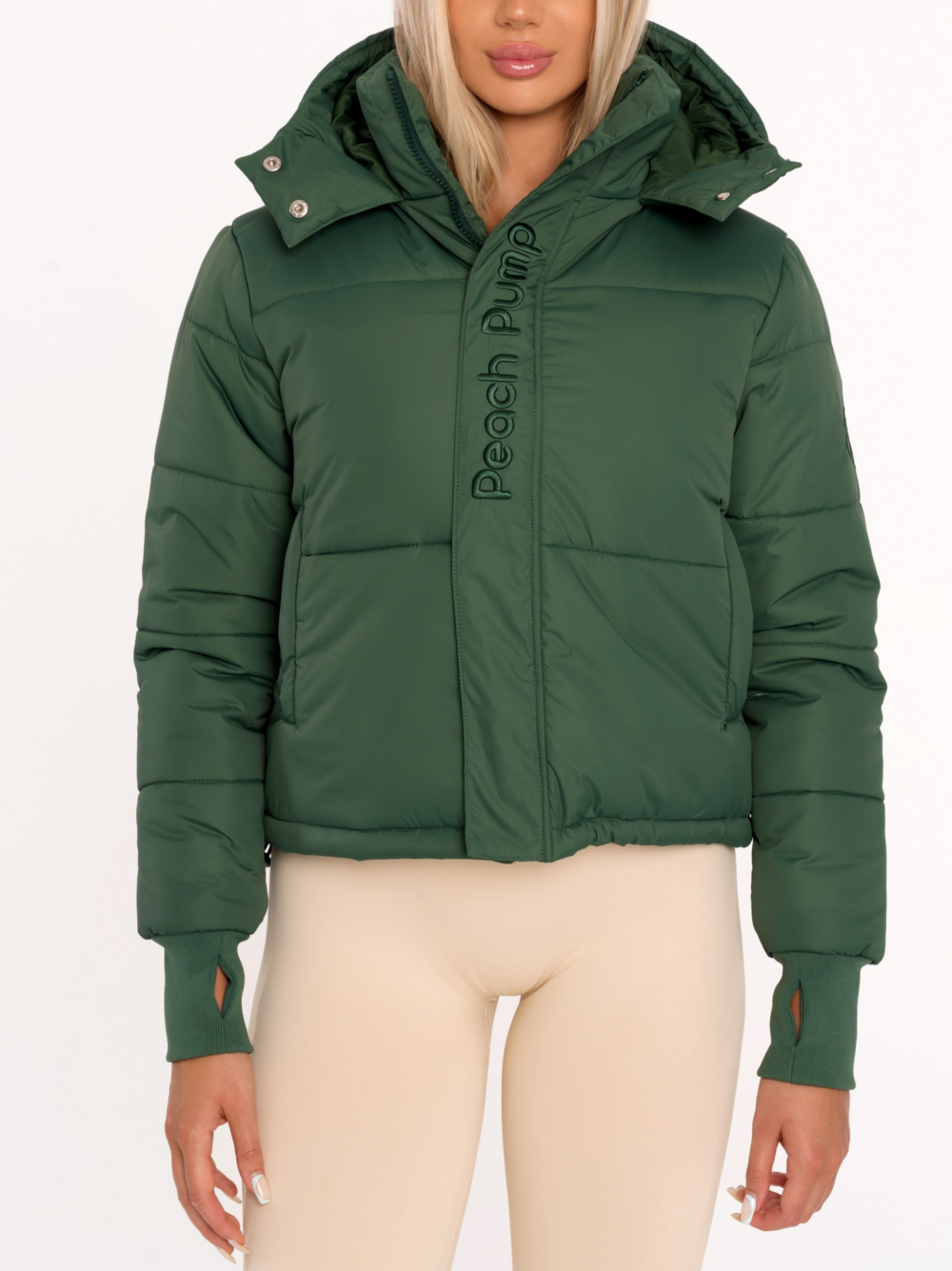 Green women’s sporty winter jacket with hood and front Peach Pump embroidery