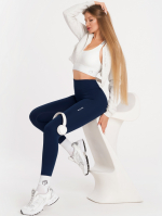 Tmavě modré sportovní legíny se středně vysokým pasem , pevná látka, která neprosvítá.