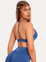 Blue sports bra with soft stretch fabric and a feminine silhouette.