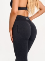 Seamless black leggings with a high ribbed waistband for comfort and stability.