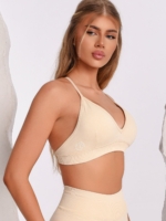 Beige sports bra with a V-neckline and an adjustable back strap for maximum comfort.