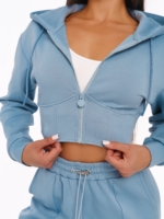 Women's light blue cropped hoodie with corset-inspired shaping seams.