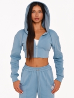 Light blue cropped hoodie with a feminine corset-inspired silhouette.