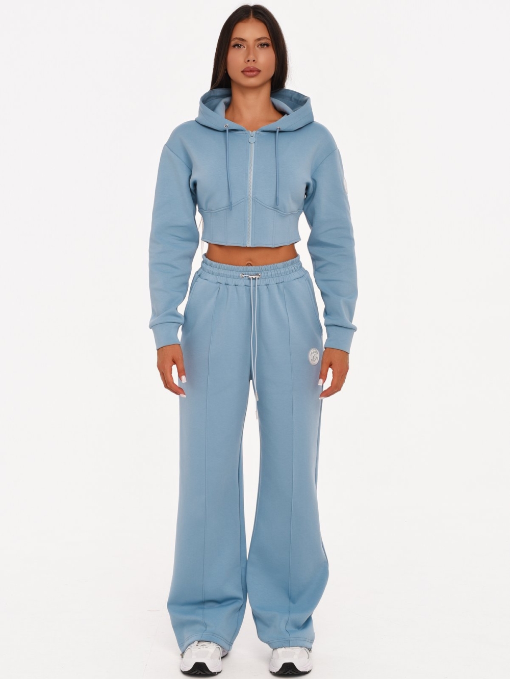 Light blue gym set made from soft cotton-blend fabric with wide leg joggers.