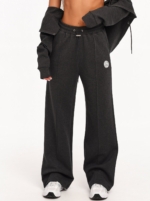 Women's black wide leg joggers made from soft cotton-blend fabric.