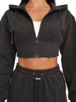 Graphite black cropped hoodie with corset-inspired seams and front zipper.