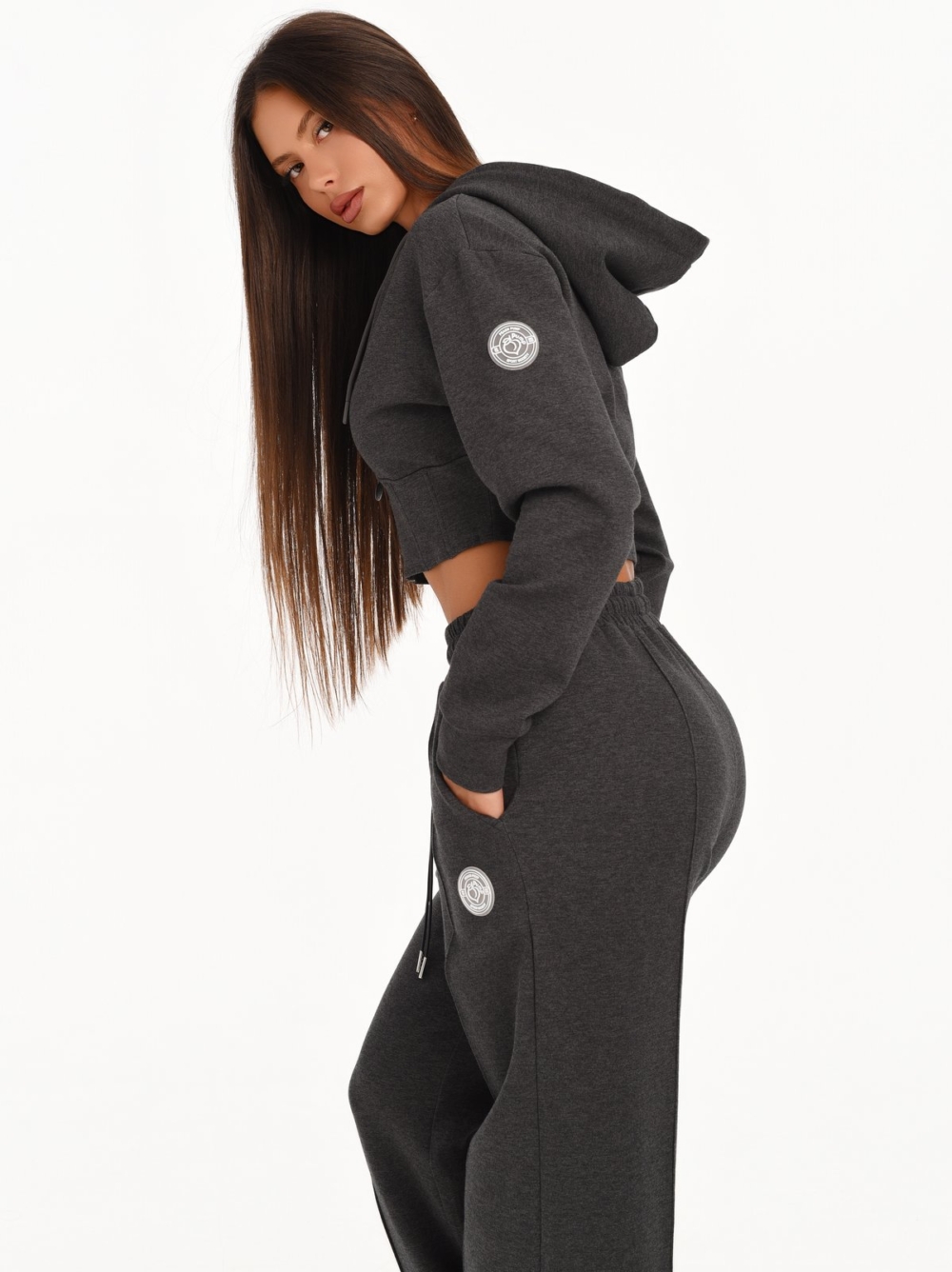 Graphite black wide leg joggers with metal details and an adjustable waistband.