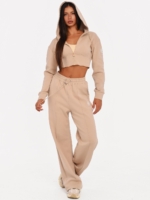 Beige gym set with large hood, elastic cuffs and wide leg joggers.