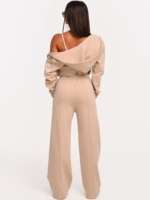 Beige wide leg joggers combining sporty comfort with a clean urban look.