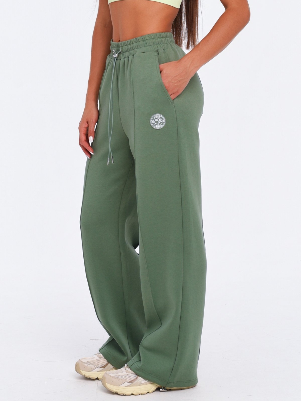 Green Wide Leg joggers with a relaxed and comfortable silhouette.