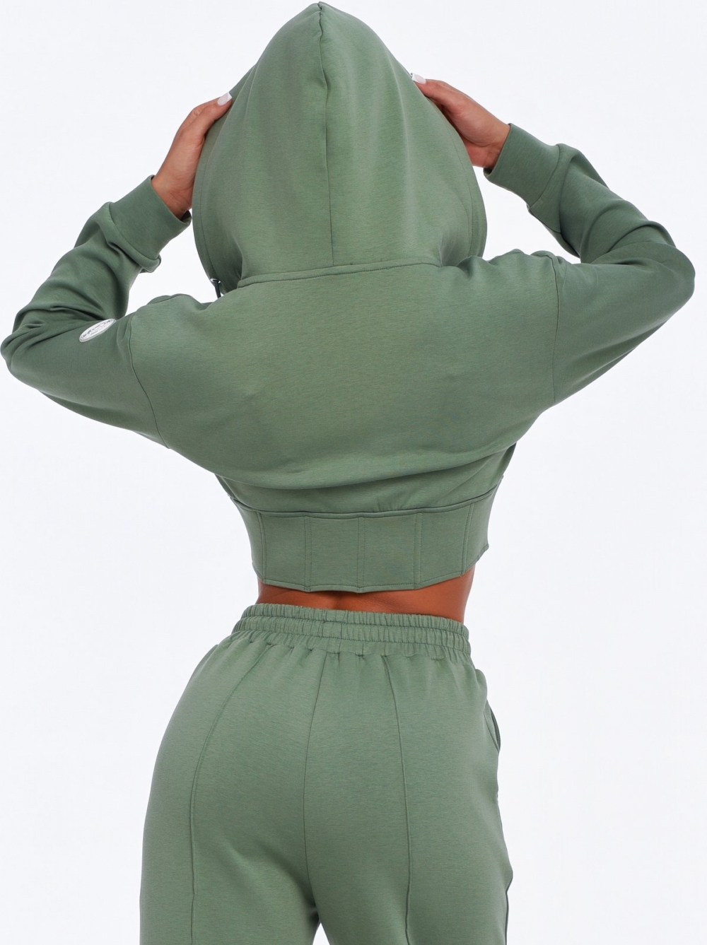 Women's green cropped hoodie for workouts and everyday wear.