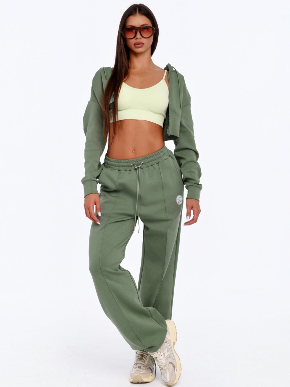 Women's green cropped hoodie Peach Pump for workouts and everyday wear.
