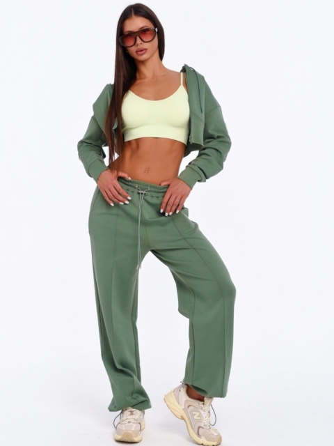 Green gym set with cropped hoodie and wide leg joggers.