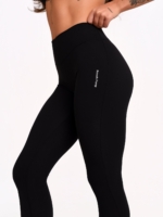 Women's shaping full-length leggings in black with a feminine athletic cut.