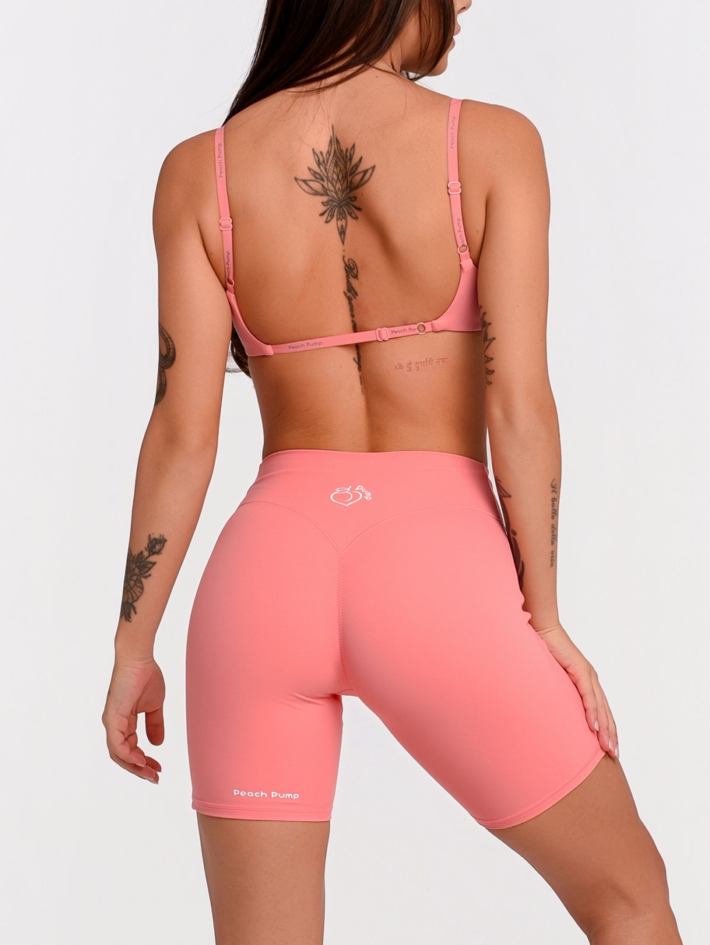 Korallrosa Fitness-Bustier mit Super Push-Up-Effekt für eine schön geformte Brust.