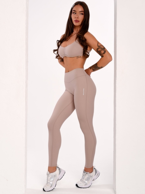 Peach Pump Beige Full-Length Fitness Leggings Made from Dense, Soft, and Stretchy Fabric.