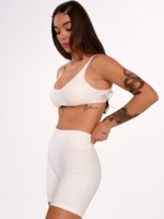 Women's Off-White bra made from soft, stretchy fabric with a feminine design.