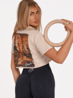 Women's cream fitness crop T-shirt with Peach Pump “Run” print.